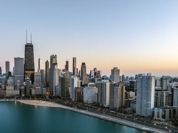 Chicago's lakefront skyline at dusk, seen from above