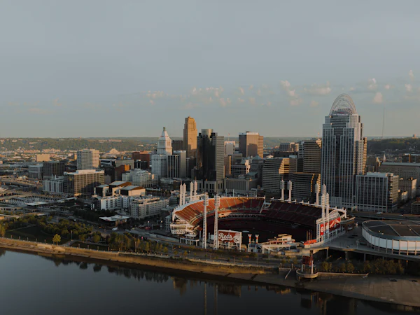 Aerial view of downtown Cincinnati, its riverfront stadium and the Ohio River