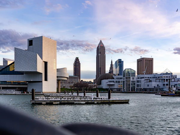 The Rock and Roll Hall of Fame and the Cleveland skyline across the harbour