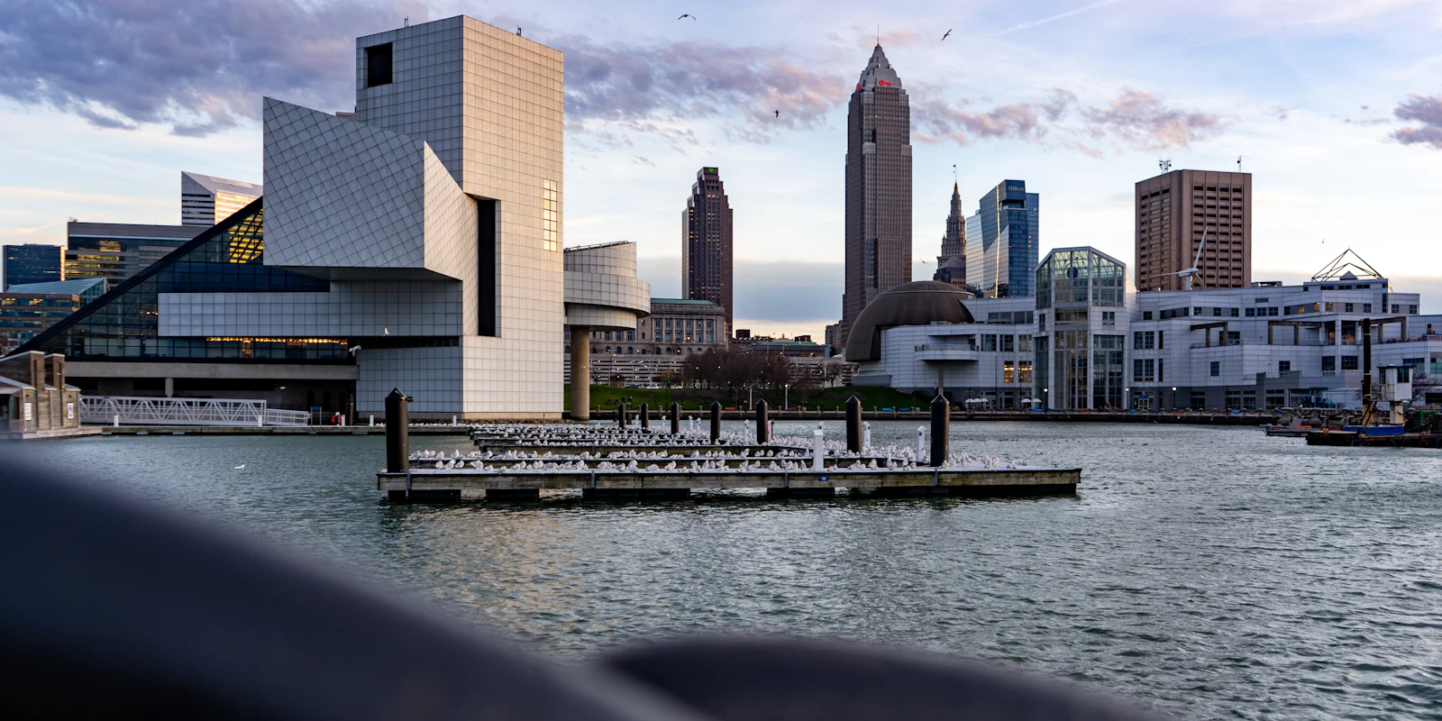 The Rock and Roll Hall of Fame and the Cleveland skyline across the harbour