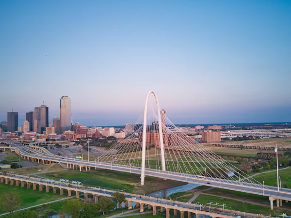 The Margaret Hunt Hill Bridge with the Dallas skyline behind