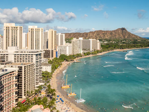 Waikiki Beach and its hotels with Diamond Head behind