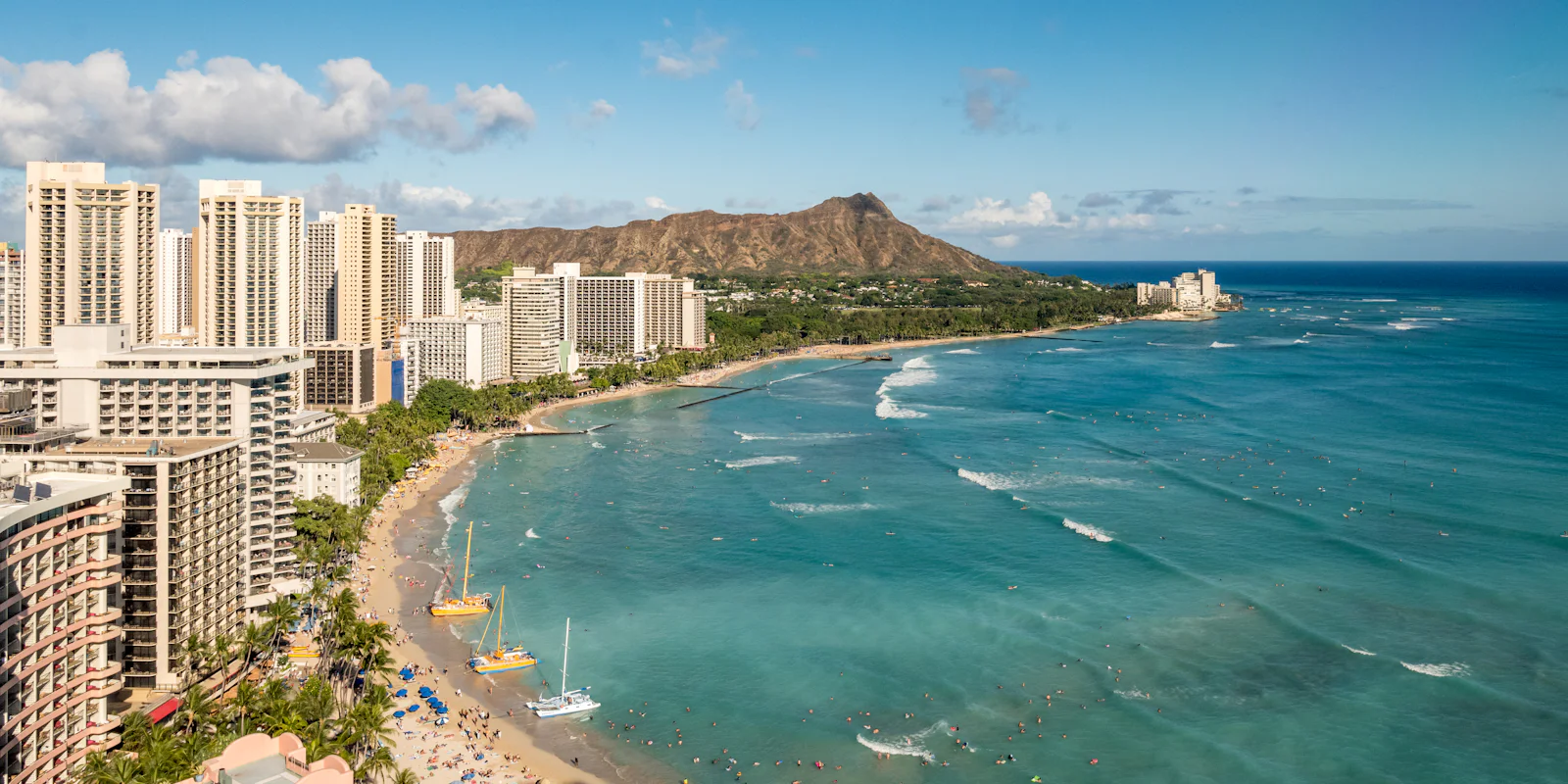 Waikiki Beach and its hotels with Diamond Head behind