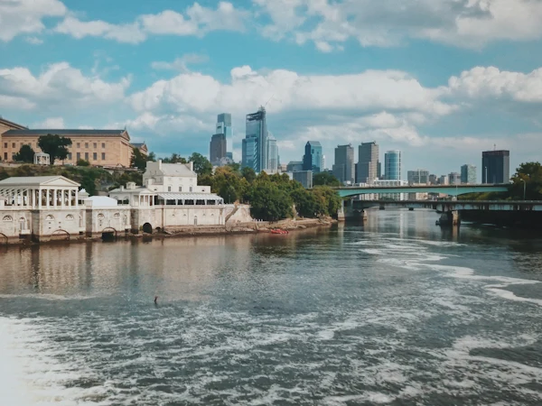The Fairmount Water Works on the Schuylkill River with the Philadelphia skyline behind